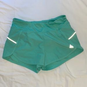 Turquoise Reebok athletic shorts